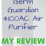 GermGuardian AC 4100 air purifier sitting on brown wood night stand